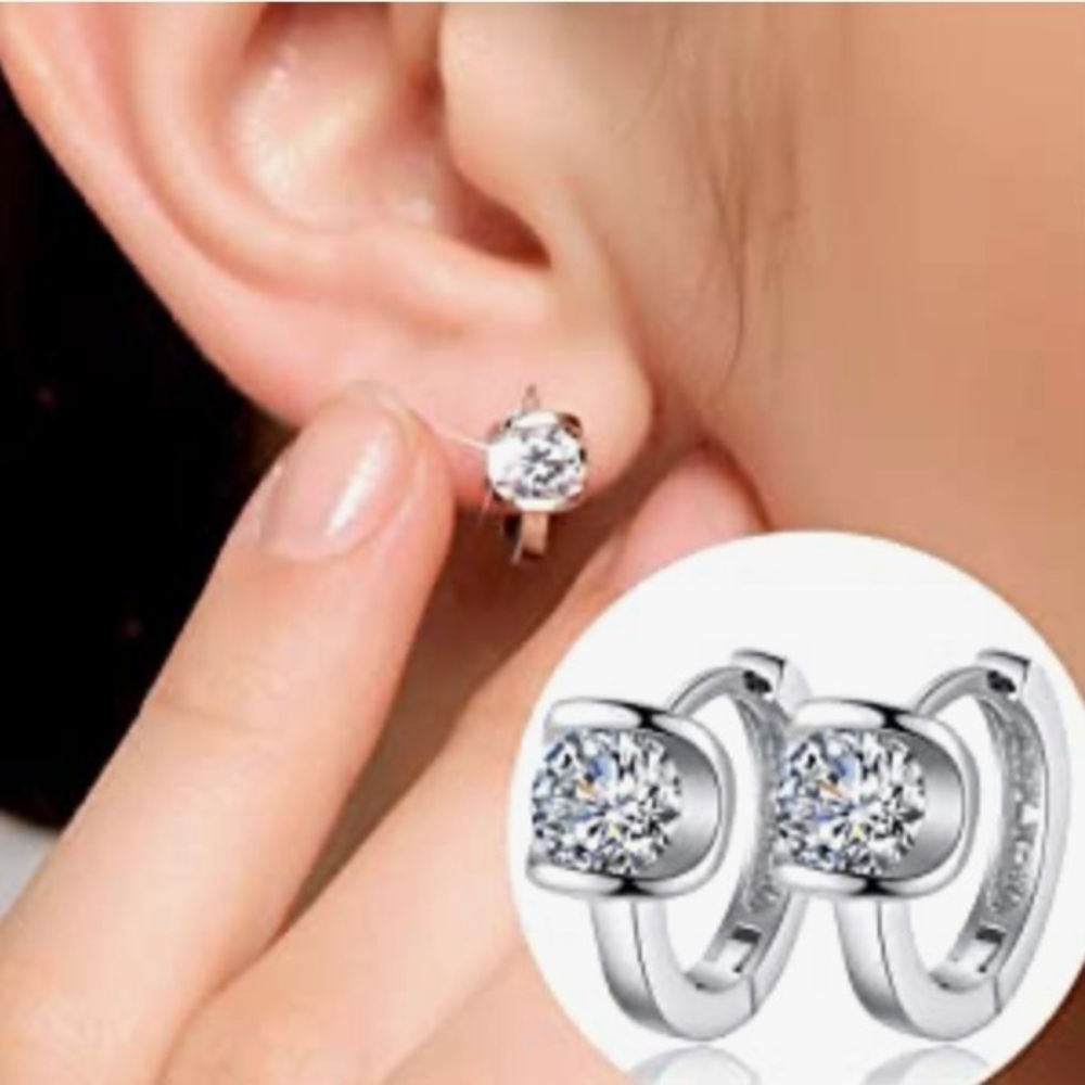 CZ and sterling silver huggie hoops. Brand new!